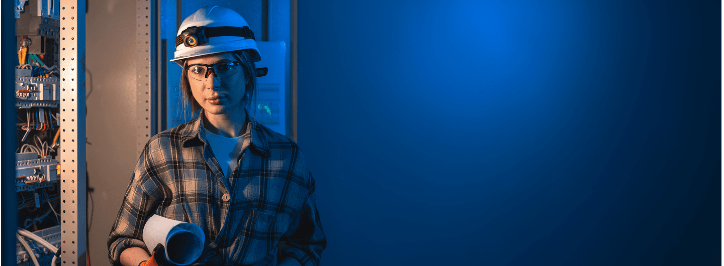 Skilled blue-collar engineer working in a factory